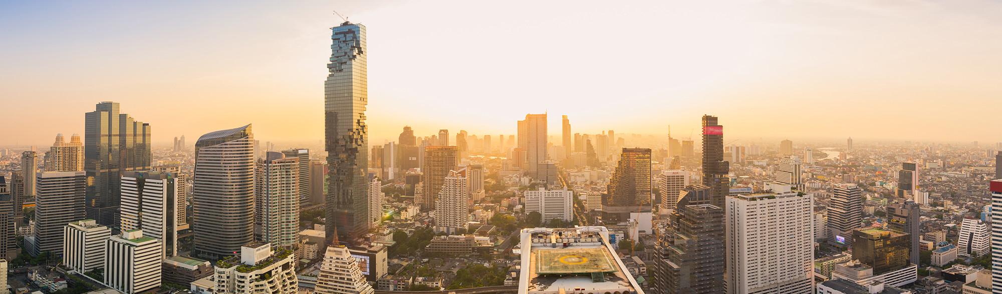Bangkok skyline at sunset over the Sathorn and Silom business district, where Evantis places foreign professionals